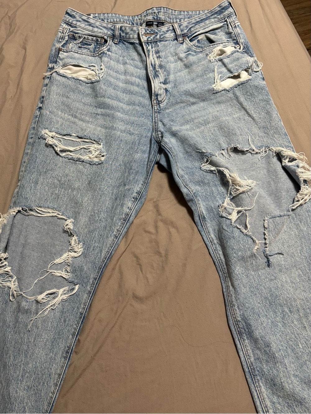 American Eagle Outfitters Women’s Light Blue Distressed Slim Jeans